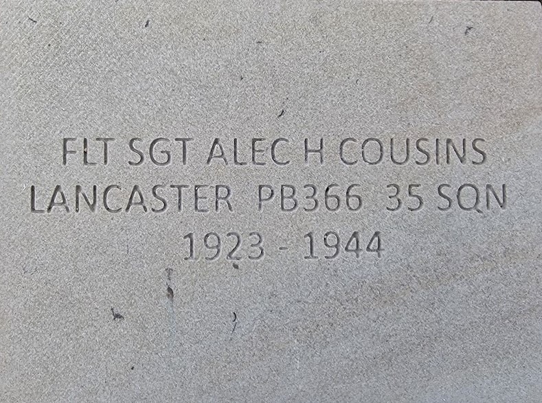 Cousins - an image of an engraved grey stone